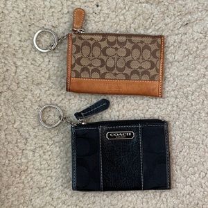 TWO coach id/card holders.